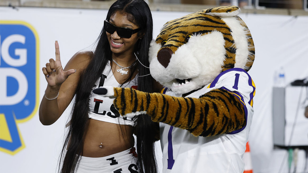 Angel Reese is seen on the sideline during a college football game between LSU and Florida State.